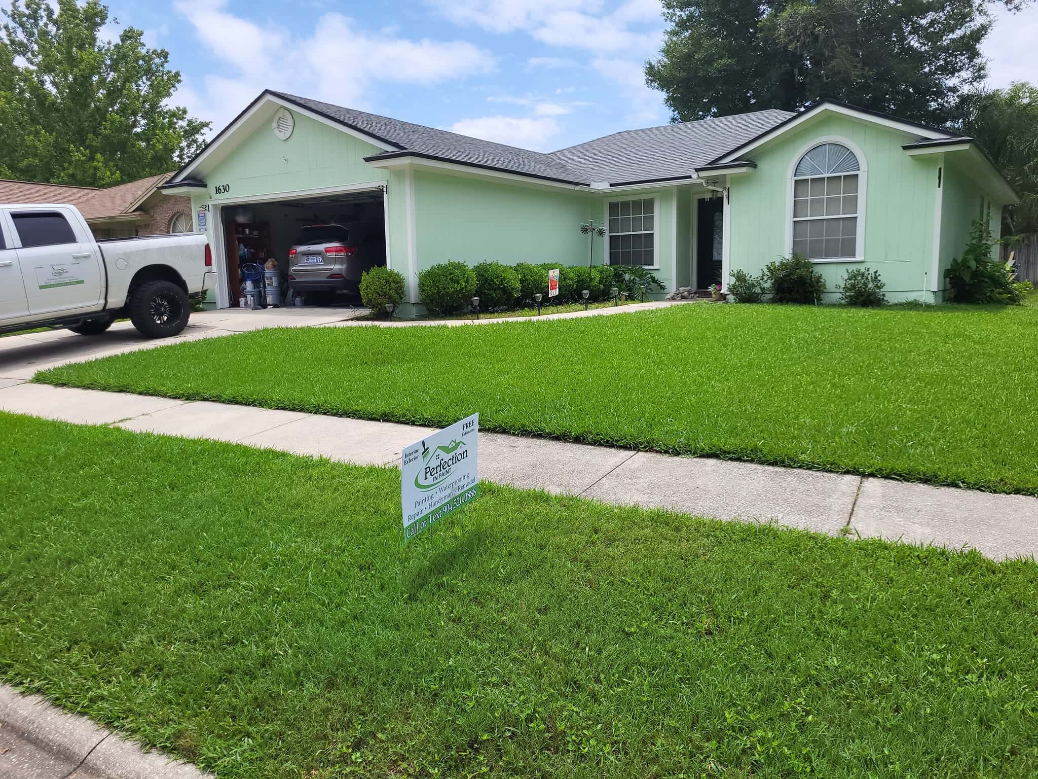 Yellow home exterior repaint, after