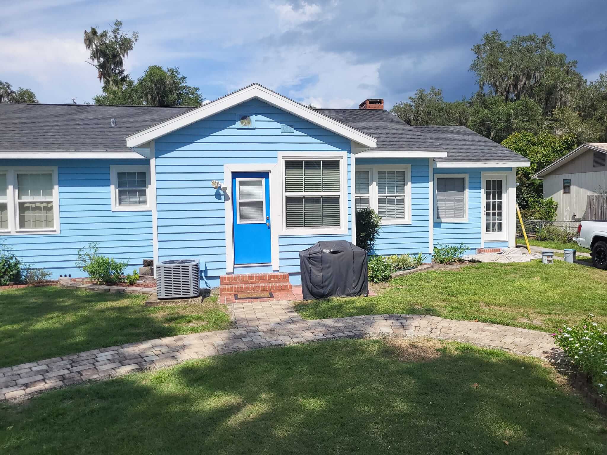 Blue house exterior repaint